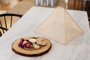 NEEPA HUT - Handmade Collapsible Woven Food Tent featuring a unique pentagon shape, made from Abaca fiber, perfect for outdoor dining and crafted by artisans in the Philippines.