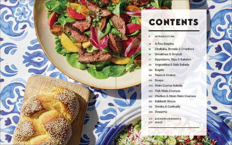 Penguin Random House LLC - Shabbat cookbook contents surrounded by a grilled steak salad, sesame challah, and grain salad, highlighting Jewish culinary traditions and weekly Shabbat meals.