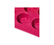 Close-up of Great Jones | Stud Muffin - Blueberry muffin pan, featuring nonstick, nontoxic surface for 12 muffins, with even heat distribution and easy cleanup.