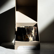 Last Candle Co - Portoro Marble Refillable Candle in a luxe taupe gift box, showcasing unique black marble veining, perfect for elegant kitchen or dining decor.