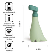OTOTO - Soapasaurus, a dinosaur-themed plastic hand soap dispenser with a green handle, adding playful charm to kitchen and bathroom settings.