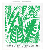 Bespoke Provisions - Tropical Leaves Swedish Dishcloth featuring a white and green leaf pattern, ideal for cleaning various kitchen surfaces.
