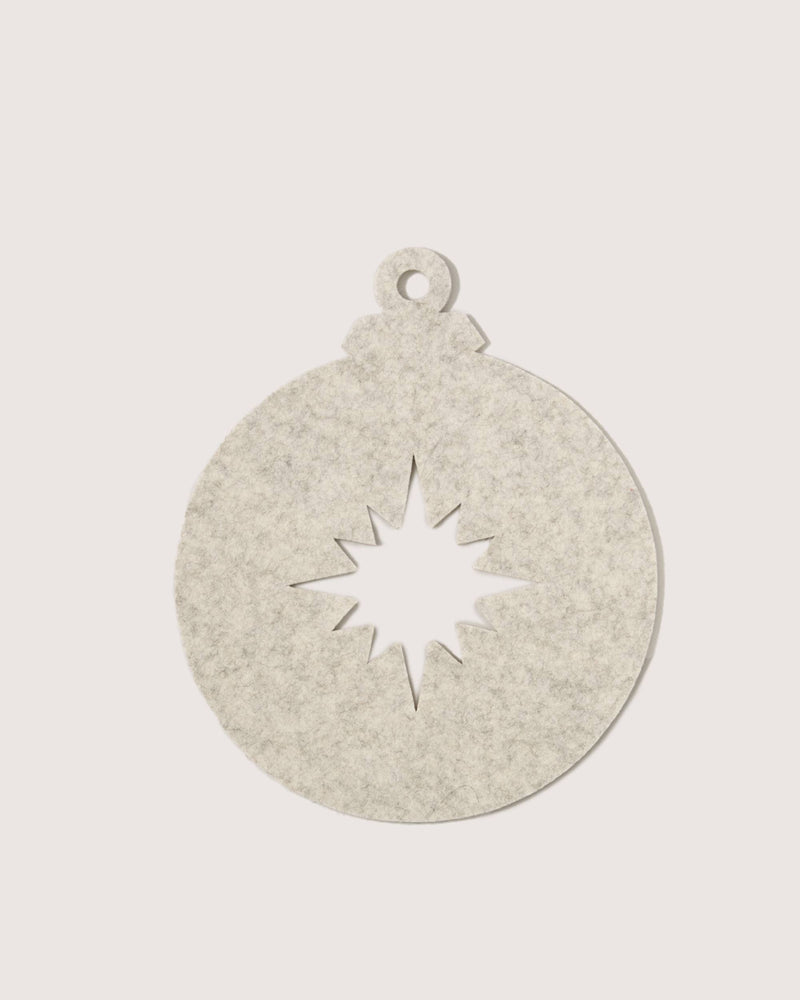 Graf Lantz - Merino Wool Bauble Trivet - Heather White, featuring an eight-pointed star cutout, ideal for festive table settings and protecting surfaces from heat.