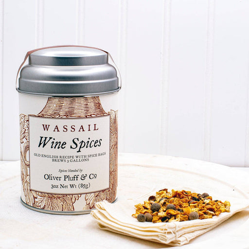 Oliver Pluff & Company - Wine Spices Wassail Kit featuring a labeled canister and a muslin spice bag, perfect for crafting traditional spiced wine or wassail.