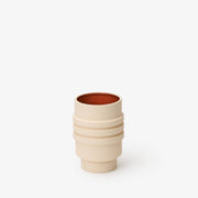 Areaware - Strata Plant Vessel: Yellow, ceramic planter with layered design, inspired by sculptural jewelry, concealing a saucer within its form. Ideal for modern kitchen aesthetics.