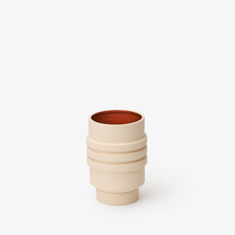 Areaware - Strata Plant Vessel: Yellow, ceramic planter with layered design, inspired by sculptural jewelry, concealing a saucer within its form. Ideal for modern kitchen aesthetics.