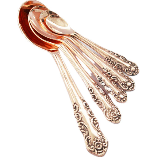 Coppermill Kitchen LLC - Coppermill Kitchen Vintage Inspired Measuring Spoon Set with ornate handles, arranged by size, featuring Beth Ann's custom embossed design in a warm finish.