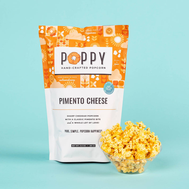 Poppy Hand | Crafted Popcorn - Pimento Cheese flavor, 3 oz bag, with a bowl of cheesy popcorn, embodying Southern culinary charm from Athens Cooks.