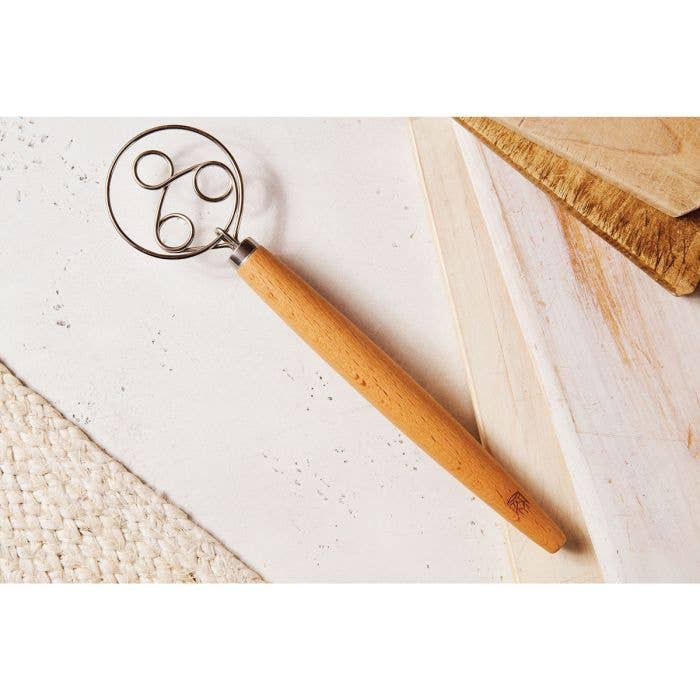 HIC - Harold Import Co. - King Arthur Baking Company Baker's Batter Whisk with a wooden handle and triple-loop stainless steel head, ideal for blending batters and mixing tasks.