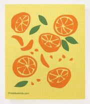 Three Bluebirds Swedish Dishcloth featuring oranges and leaves on a yellow background, eco-friendly and highly absorbent, perfect for sustainable kitchen cleaning.