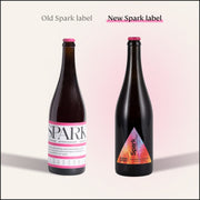 Comparison of Two Three Spirit | Blurred Vines Spark Bottles: Old label with bold SPARK vs. new triangular gradient design featuring Spark and Three Spirit logo.