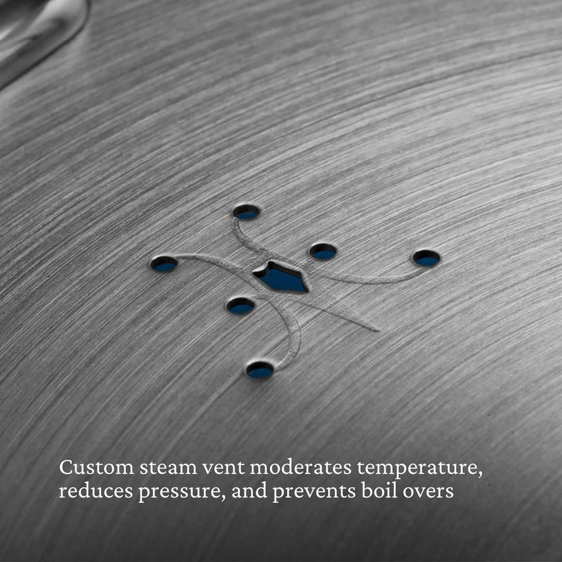 Hestan Provisions | Commercial Clad Stainless Steel Universal Lid, 8.5 Inches, showcasing steam-vent cutouts and etched curves for efficient cooking and eco-friendly design.