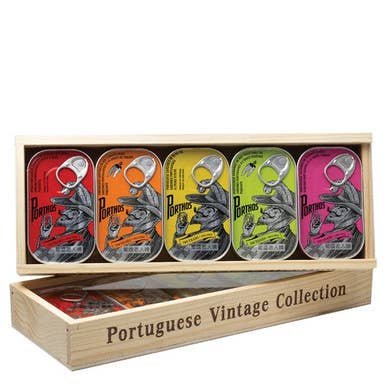 The French Farm - Conservas Sardines in Wood Gift Box features five retro-style tins of Portuguese sardines, perfect for seafood enthusiasts.