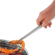 Küchenprofi Tweezer Tongs, 8.75, deftly handle shrimp on a grill, showcasing precision cooking essential for Athens Cooks' curated kitchenware collection.