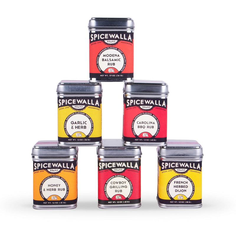 Spicewalla | Grill & Roast Gift Collection, 6-Pack: A pyramid stack of six tins featuring diverse seasonings for enhancing grilled and roasted dishes with smoky, tangy, and herbaceous flavors.