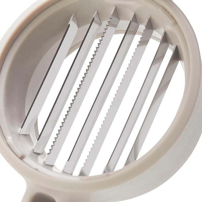 Chef'n FreshForce Handheld Slicer with circular design, featuring dual serrated blades for slicing mushrooms, strawberries, and more efficiently without knives.