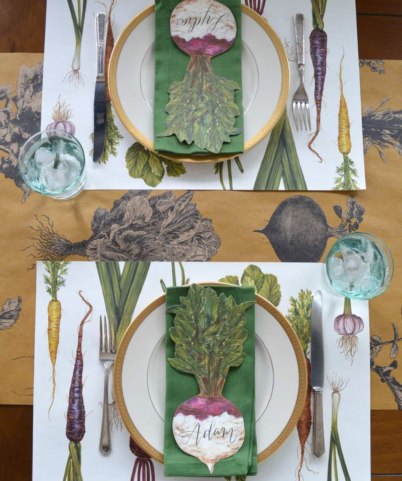 Hester & Cook | Farmer's Market Runner set on a table with plates, silverware, and a napkin featuring a beet cutout.