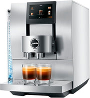 Jura Z10 Fully Automatic Espresso and Coffee Machine with two glasses of brewed coffee, a premium kitchen appliance available at Athens Cooks.