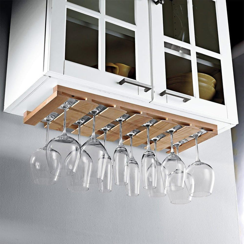 J.K. Adams Stemware Rack mounted under a kitchen cabinet, holding wine glasses upside-down in its slotted design, demonstrating efficient under-cabinet storage for up to 15 glasses.
