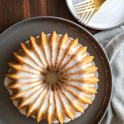 Nordic Ware | Brilliance 5 Cup Bundt on a plate, showcasing intricate cake details from a durable cast aluminum pan, ideal for creating perfect Bundt cakes.