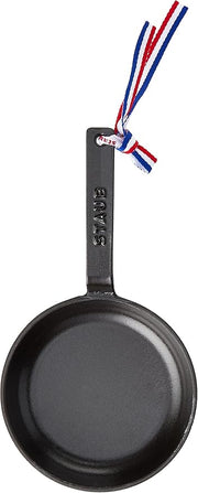 Staub | Mini Cast Iron Frying Pan - Black, perfect for small servings, showcasing durable construction ideal for cooking enthusiasts.