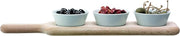 LSA International Dine Bowl Set with Oak Paddle, featuring three porcelain bowls ideal for serving olives and nuts, perfect for enhancing your dining table's rustic appeal.
