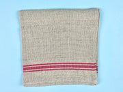 Thieffry | Monogramme Linen Tablecloth close-up showcasing intricate weave and texture, emphasizing luxurious craftsmanship and durability, ideal for enhancing dining experiences.