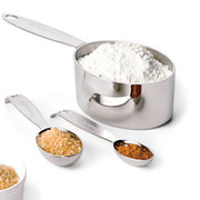Cuisipro | RECEIVE ONLY Measuring Cup & Spoon Set SS with various types of flour and spices, ideal for precise baking and cooking.