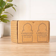 Moroccan Cone Champagne Glasses - Set of 6, handblown from recycled wine bottles, showcasing unique shapes and bubbles, ideal for toasting or as decorative vases.