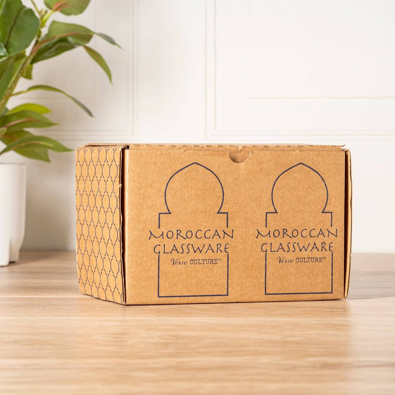 Moroccan Cone Champagne Glasses - Set of 6, handblown from recycled wine bottles, showcasing unique shapes and bubbles, ideal for toasting or as decorative vases.