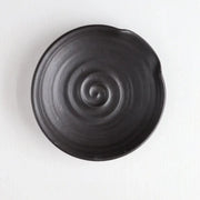 Gravesco Pottery - Handmade Pottery Spoon Rest in Black, viewed from above, features concentric spiral ridges, perfect for holding cooking utensils. Dishwasher safe, 5.5 diameter.