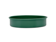 Great Jones | Patty Cake - Broccoli, featuring a wavy, corrugated bottom for easy release, crafted from nonstick ceramic for even baking. Oven and dishwasher safe.