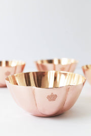 Copper bowl with scalloped rim and crown engraving from Coppermill Kitchen LLC, part of Athens Cooks' vintage collection, showcasing European elegance and durability for serving or decor.