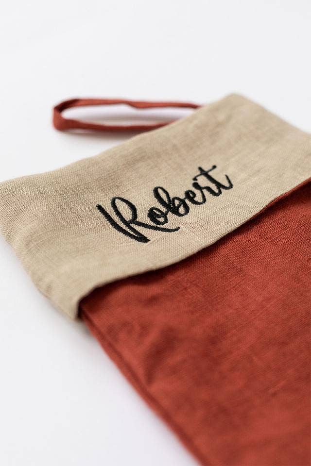 MagicLinen - Embroidered Christmas Stocking in red clay and natural linen, personalized with Roberti, featuring a hanging loop, crafted from soft linen for a festive touch.