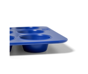 Great Jones | Stud Muffin - Blueberry, a nonstick, nontoxic muffin pan with four holes, ideal for baking muffins or cupcakes.
