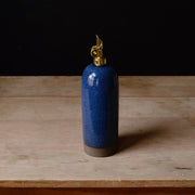 Rose Line Pottery - Oil Bottle - Denim Blue - 22 Ounces, handcrafted ceramic with gold-plated spout, ideal for oils and syrups, displayed on a wooden surface.