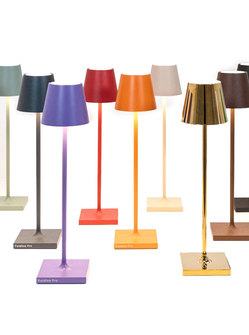 Zafferano America - Poldina Pro Micro Cordless Lamp: White, featuring a sleek design with touch dimming, suitable for indoor and outdoor use. Includes a contact induction charging base.