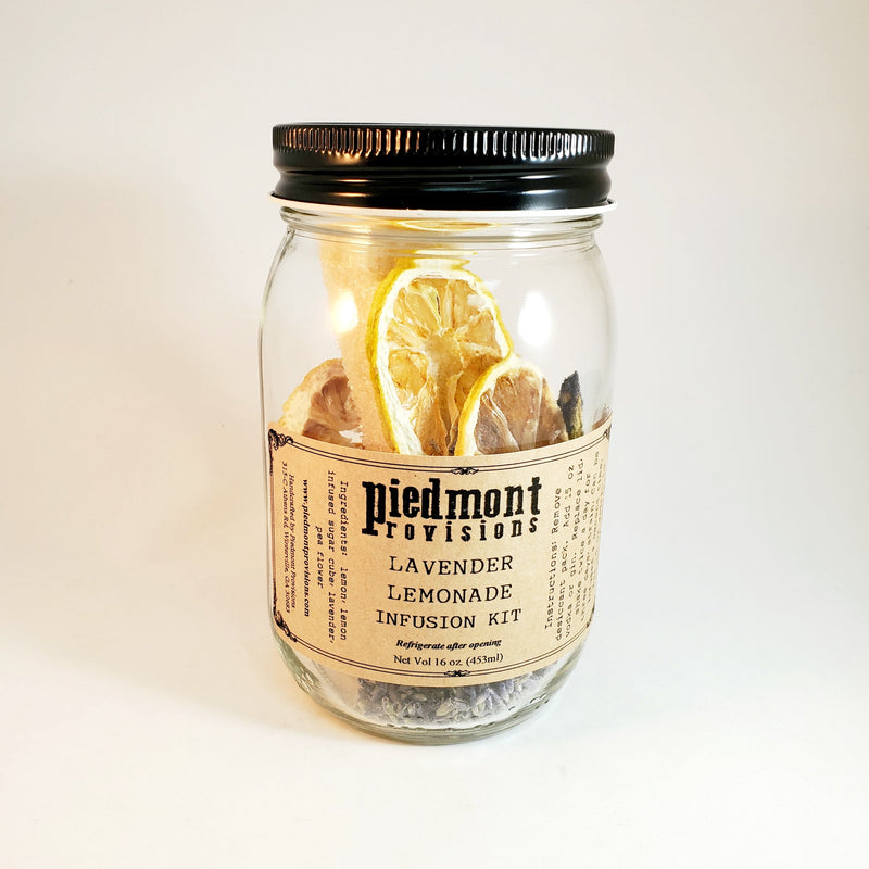 Piedmont Provisions Lavender Lemonade Cocktail Infusion Kit in a mason jar with a lid, designed for making infused spirits with ease.