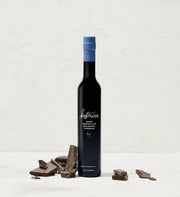Kosterina - Dark Chocolate Balsamic Vinegar (375ml) bottle next to chocolate pieces, highlighting its rich, velvety flavor profile.