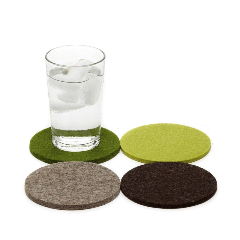 Graf Lantz - Bierfilzl Merino Wool Felt Round Coaster Multi 4 Pack: Forest shown with a glass of water on a coaster, highlighting its absorbent quality.