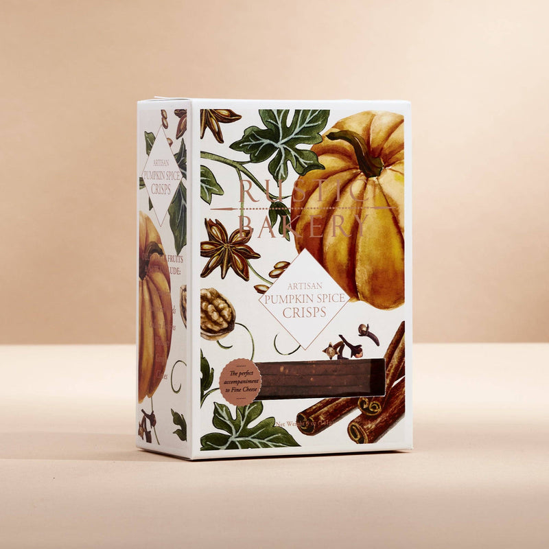 Rustic Bakery - Pumpkin Artisan Crisps box features fall-themed illustrations, showcasing a window with thin crisps inside, highlighting seasonal flavors of pumpkin and spices.