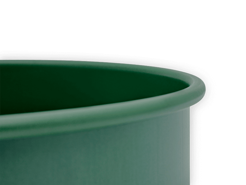 Great Jones | Patty Cake - Broccoli: A green baking bowl with a wavy, corrugated bottom, designed for easy release and even baking results.