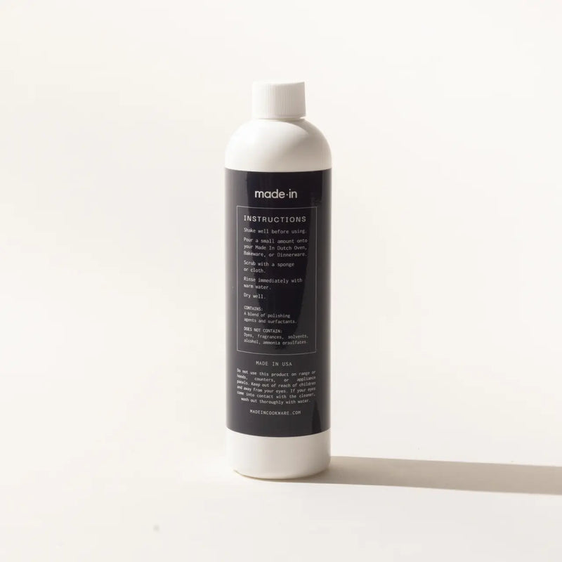 Made In | Ceramic Cleaner in a tall white squeeze-bottle, ideal for polishing cookware, removing stains and residue from bakeware and enameled cast iron.