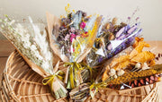Idlewild Floral Co. - Christmas Mini Market Bouquet features colorful dried flowers in kraft paper, perfect as lasting, maintenance-free decor for any space.