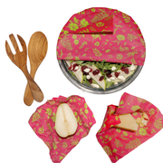 Bee's Wrap - Assorted 3 Pack - Splendid Spring: Reusable fabric food wraps with modern spring print, featuring a wrapped plate of food, wooden spoon, and half pear.