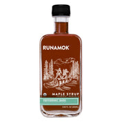 Runamok - Peppermint Bark Organic Maple Syrup 250ml in a slender glass bottle, combining mint, cocoa, and maple flavors for festive culinary delights.