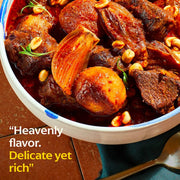 Diaspora Co. Spices - Wild Cinnamon Quills in a bowl, featuring meat and nuts, highlighting their aromatic enhancement for dishes, sourced from Sri Lanka.