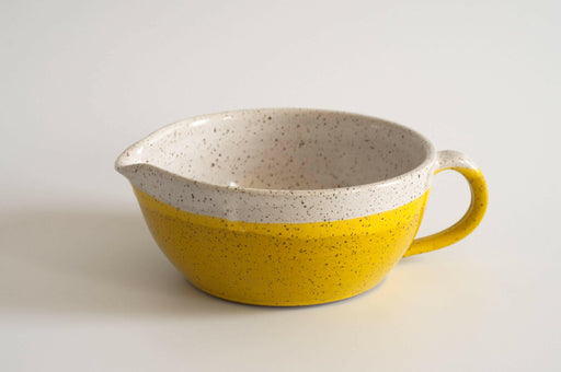 RachaelPots | Salad Dressing Bowl - Nude, a versatile hand-thrown pottery piece with a garlic scraper, handle, and pour spout, ideal for dressings or guacamole.