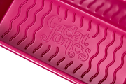Great Jones | Breadwinner - Raspberry loaf pan with nonstick, corrugated bottom for easy release of baked goods. Ideal for ensuring perfect banana bread every time.