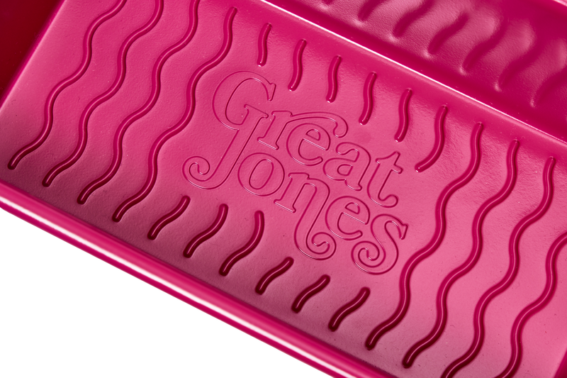 Great Jones | Breadwinner - Raspberry loaf pan with nonstick, corrugated bottom for easy release of baked goods. Ideal for ensuring perfect banana bread every time.